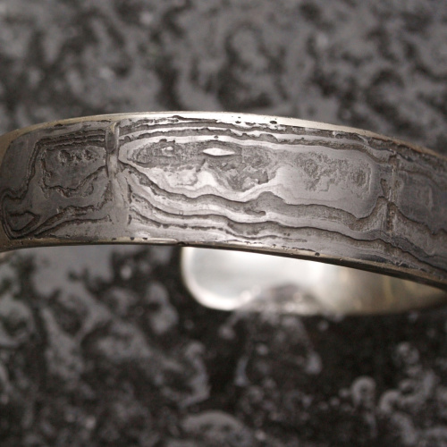 Damast stalen armband met zilver.jpg